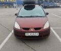 Червоний Міцубісі Кольт, об'ємом двигуна 1.33 л та пробігом 301 тис. км за 3499 $, фото 9 на Automoto.ua
