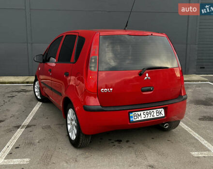 Красный Мицубиси Кольт, объемом двигателя 1.3 л и пробегом 155 тыс. км за 4489 $, фото 3 на Automoto.ua