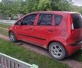 Красный Мицубиси Кольт, объемом двигателя 1.3 л и пробегом 215 тыс. км за 4432 $, фото 2 на Automoto.ua
