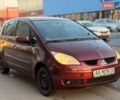 Красный Мицубиси Кольт, объемом двигателя 1.5 л и пробегом 370 тыс. км за 2999 $, фото 1 на Automoto.ua
