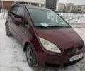 Красный Мицубиси Кольт, объемом двигателя 1.3 л и пробегом 143 тыс. км за 4100 $, фото 1 на Automoto.ua