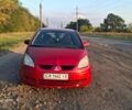 Червоний Міцубісі Кольт, об'ємом двигуна 1.3 л та пробігом 259 тис. км за 3999 $, фото 5 на Automoto.ua