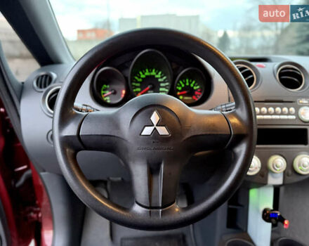 Червоний Міцубісі Кольт, об'ємом двигуна 1.3 л та пробігом 127 тис. км за 4999 $, фото 23 на Automoto.ua