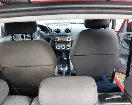 Червоний Міцубісі Кольт, об'ємом двигуна 1.33 л та пробігом 118 тис. км за 5500 $, фото 9 на Automoto.ua