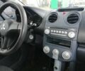 Красный Мицубиси Кольт, объемом двигателя 1.3 л и пробегом 202 тыс. км за 4800 $, фото 1 на Automoto.ua