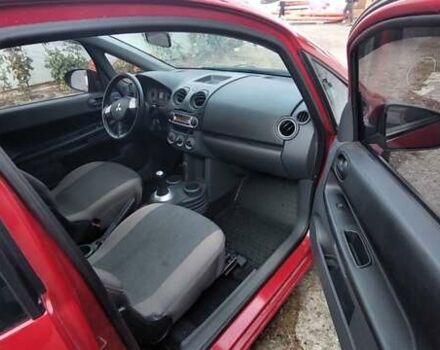 Червоний Міцубісі Кольт, об'ємом двигуна 1.33 л та пробігом 118 тис. км за 5500 $, фото 8 на Automoto.ua