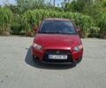 Красный Мицубиси Кольт, объемом двигателя 1.3 л и пробегом 159 тыс. км за 4687 $, фото 1 на Automoto.ua