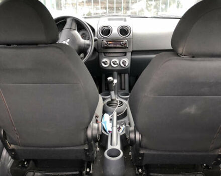 Мицубиси Кольт 2009 в Харькове на Automoto.ua Красный Мицубиси Кольт, объемом двигателя 1.1 л и пробегом 190 тыс. км за 4000 $, фото 3 на Automoto.ua