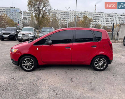 Красный Мицубиси Кольт, объемом двигателя 1.33 л и пробегом 203 тыс. км за 5499 $, фото 2 на Automoto.ua