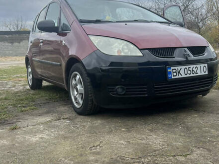 Красный Мицубиси Кольт, объемом двигателя 1.4 л и пробегом 241 тыс. км за 3300 $, фото 1 на Automoto.ua