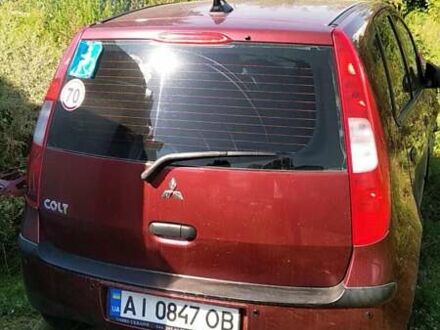 Мицубиси Кольт 2006 в Киеве на Automoto.ua Красный Мицубиси Кольт, объемом двигателя 1.33 л и пробегом 168 тыс. км за 1300 $, фото 1 на Automoto.ua