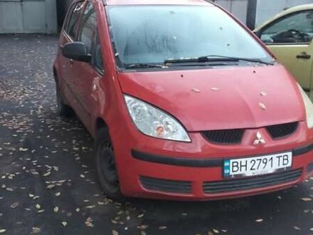 Красный Мицубиси Кольт, объемом двигателя 1.12 л и пробегом 252 тыс. км за 4000 $, фото 1 на Automoto.ua