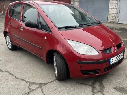 Красный Мицубиси Кольт, объемом двигателя 1.33 л и пробегом 175 тыс. км за 5000 $, фото 1 на Automoto.ua