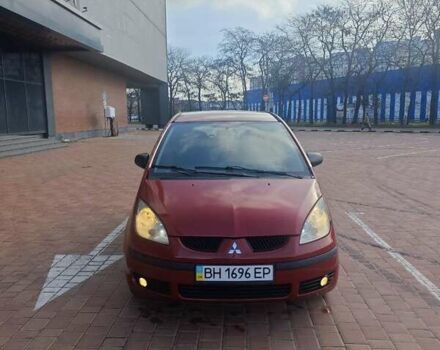 Красный Мицубиси Кольт, объемом двигателя 1.33 л и пробегом 311 тыс. км за 4800 $, фото 1 на Automoto.ua