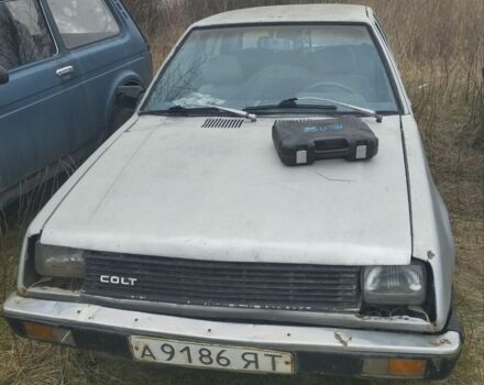 Серый Мицубиси Кольт, объемом двигателя 1.2 л и пробегом 100 тыс. км за 262 $, фото 1 на Automoto.ua