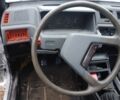 Серый Мицубиси Кольт, объемом двигателя 1 л и пробегом 220 тыс. км за 192 $, фото 4 на Automoto.ua