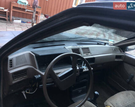 Серый Мицубиси Кольт, объемом двигателя 1.5 л и пробегом 290 тыс. км за 399 $, фото 2 на Automoto.ua