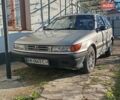 Серый Мицубиси Кольт, объемом двигателя 1.3 л и пробегом 280 тыс. км за 1200 $, фото 1 на Automoto.ua