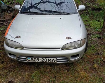 Сірий Міцубісі Кольт, об'ємом двигуна 1 л та пробігом 100 тис. км за 945 $, фото 1 на Automoto.ua