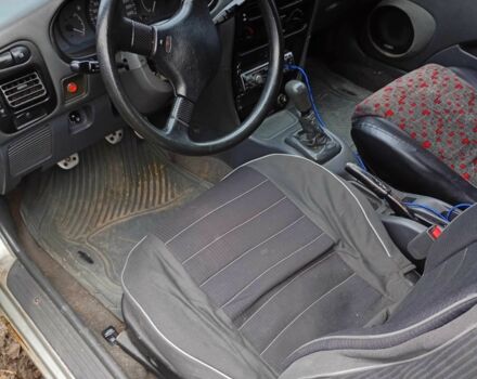 Сірий Міцубісі Кольт, об'ємом двигуна 1 л та пробігом 100 тис. км за 945 $, фото 6 на Automoto.ua