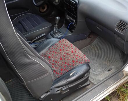 Сірий Міцубісі Кольт, об'ємом двигуна 1 л та пробігом 100 тис. км за 945 $, фото 4 на Automoto.ua