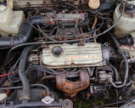 Сірий Міцубісі Кольт, об'ємом двигуна 1 л та пробігом 100 тис. км за 945 $, фото 7 на Automoto.ua