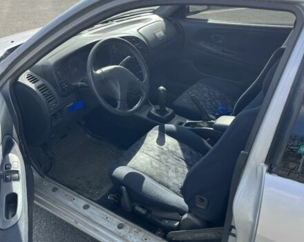 Серый Мицубиси Кольт, объемом двигателя 1.6 л и пробегом 316 тыс. км за 800 $, фото 6 на Automoto.ua