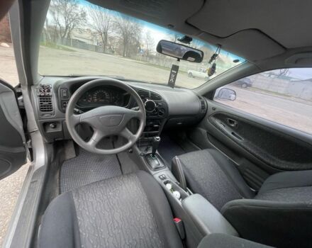 Серый Мицубиси Кольт, объемом двигателя 1.6 л и пробегом 203 тыс. км за 3550 $, фото 5 на Automoto.ua