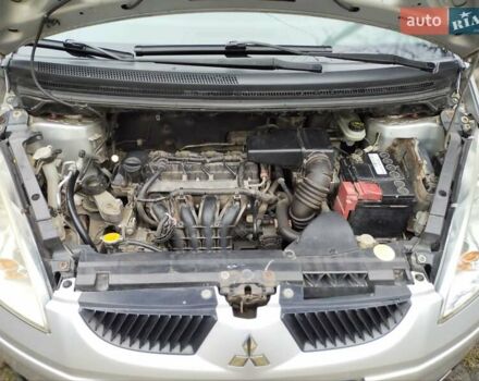 Мицубиси Кольт 2004 в Катеринополе на Automoto.ua Серый Мицубиси Кольт, объемом двигателя 1.33 л и пробегом 192 тыс. км за 3700 $, фото 20 на Automoto.ua