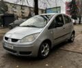 Серый Мицубиси Кольт, объемом двигателя 1.3 л и пробегом 350 тыс. км за 3100 $, фото 1 на Automoto.ua