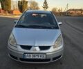 Серый Мицубиси Кольт, объемом двигателя 1.3 л и пробегом 590 тыс. км за 3900 $, фото 1 на Automoto.ua