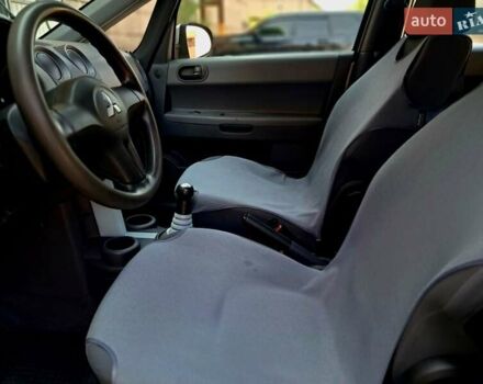 Серый Мицубиси Кольт, объемом двигателя 1.3 л и пробегом 160 тыс. км за 4600 $, фото 23 на Automoto.ua