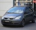 Серый Мицубиси Кольт, объемом двигателя 1.3 л и пробегом 177 тыс. км за 4400 $, фото 1 на Automoto.ua