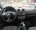 Серый Мицубиси Кольт, объемом двигателя 1.33 л и пробегом 146 тыс. км за 5000 $, фото 6 на Automoto.ua