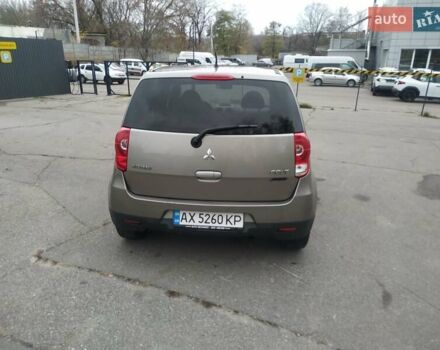 Серый Мицубиси Кольт, объемом двигателя 1.33 л и пробегом 146 тыс. км за 5000 $, фото 2 на Automoto.ua