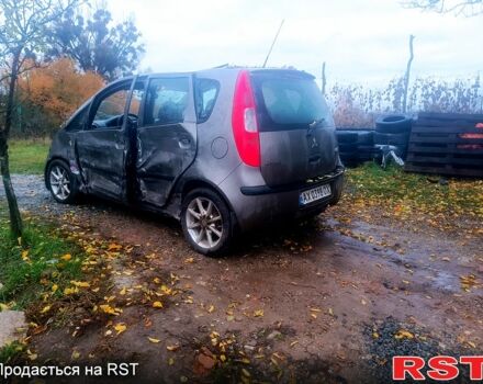 Сірий Міцубісі Кольт, об'ємом двигуна 1.3 л та пробігом 200 тис. км за 1299 $, фото 3 на Automoto.ua