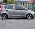 Сірий Міцубісі Кольт, об'ємом двигуна 1.33 л та пробігом 105 тис. км за 4999 $, фото 3 на Automoto.ua