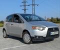 Серый Мицубиси Кольт, объемом двигателя 1.12 л и пробегом 252 тыс. км за 3900 $, фото 1 на Automoto.ua