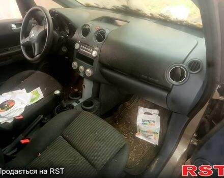 Сірий Міцубісі Кольт, об'ємом двигуна 1.3 л та пробігом 200 тис. км за 1299 $, фото 9 на Automoto.ua