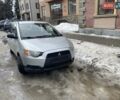 Серый Мицубиси Кольт, объемом двигателя 1.3 л и пробегом 160 тыс. км за 100 $, фото 1 на Automoto.ua