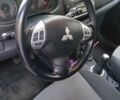 Серый Мицубиси Кольт, объемом двигателя 1.3 л и пробегом 150 тыс. км за 5600 $, фото 1 на Automoto.ua