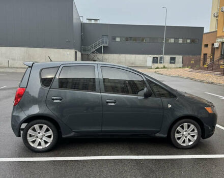 Мицубиси Кольт 2012 в Вишневом на Automoto.ua Серый Мицубиси Кольт, объемом двигателя 1.33 л и пробегом 83 тыс. км за 6900 $, фото 3 на Automoto.ua