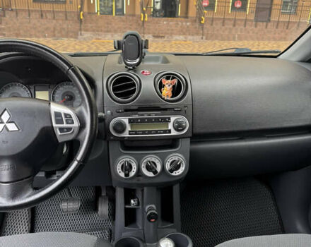 Мицубиси Кольт 2012 в Вишневом на Automoto.ua Серый Мицубиси Кольт, объемом двигателя 1.33 л и пробегом 83 тыс. км за 6900 $, фото 9 на Automoto.ua