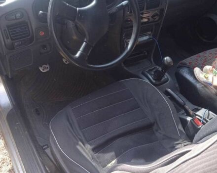 Сірий Міцубісі Кольт, об'ємом двигуна 10 л та пробігом 1000 тис. км за 950 $, фото 2 на Automoto.ua