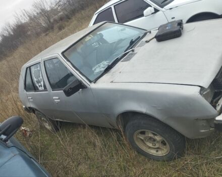 Серый Мицубиси Кольт, объемом двигателя 1.2 л и пробегом 100 тыс. км за 262 $, фото 1 на Automoto.ua