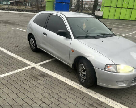 Сірий Міцубісі Кольт, об'ємом двигуна 1.3 л та пробігом 220 тис. км за 1750 $, фото 1 на Automoto.ua