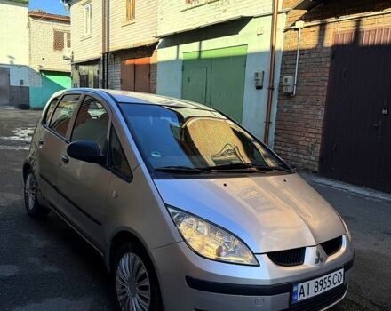 Серый Мицубиси Кольт, объемом двигателя 1.5 л и пробегом 250 тыс. км за 3400 $, фото 1 на Automoto.ua