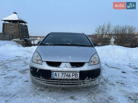 Серый Мицубиси Кольт, объемом двигателя 1.33 л и пробегом 183 тыс. км за 3600 $, фото 1 на Automoto.ua