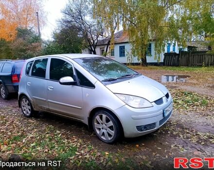 Серый Мицубиси Кольт, объемом двигателя 1.5 л и пробегом 220 тыс. км за 3500 $, фото 1 на Automoto.ua