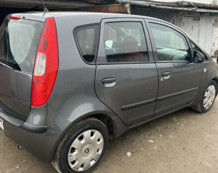 Серый Мицубиси Кольт, объемом двигателя 1.3 л и пробегом 218 тыс. км за 3950 $, фото 1 на Automoto.ua